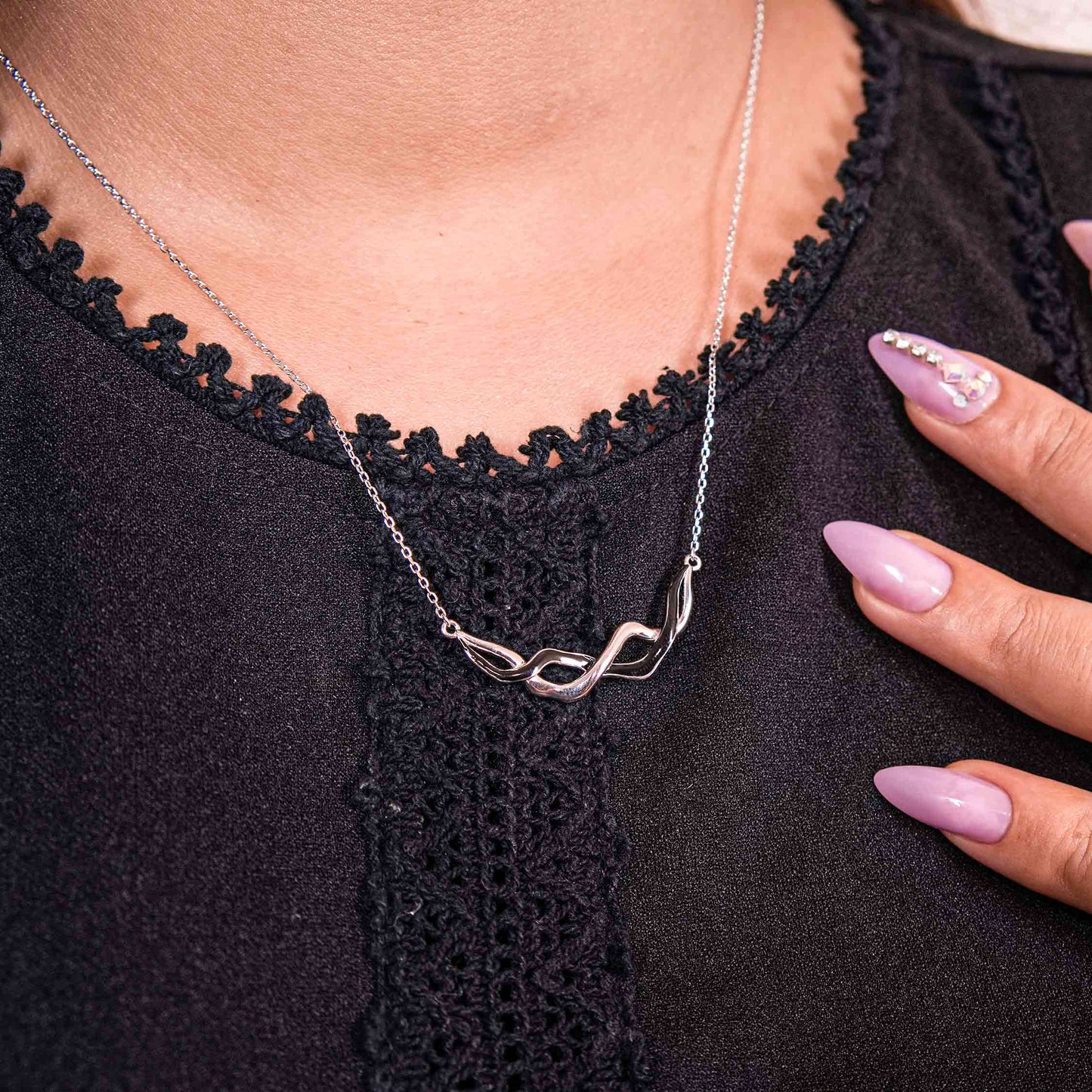 Entwined Infinity silver chain pendant