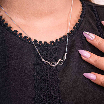 Entwined Infinity silver chain pendant